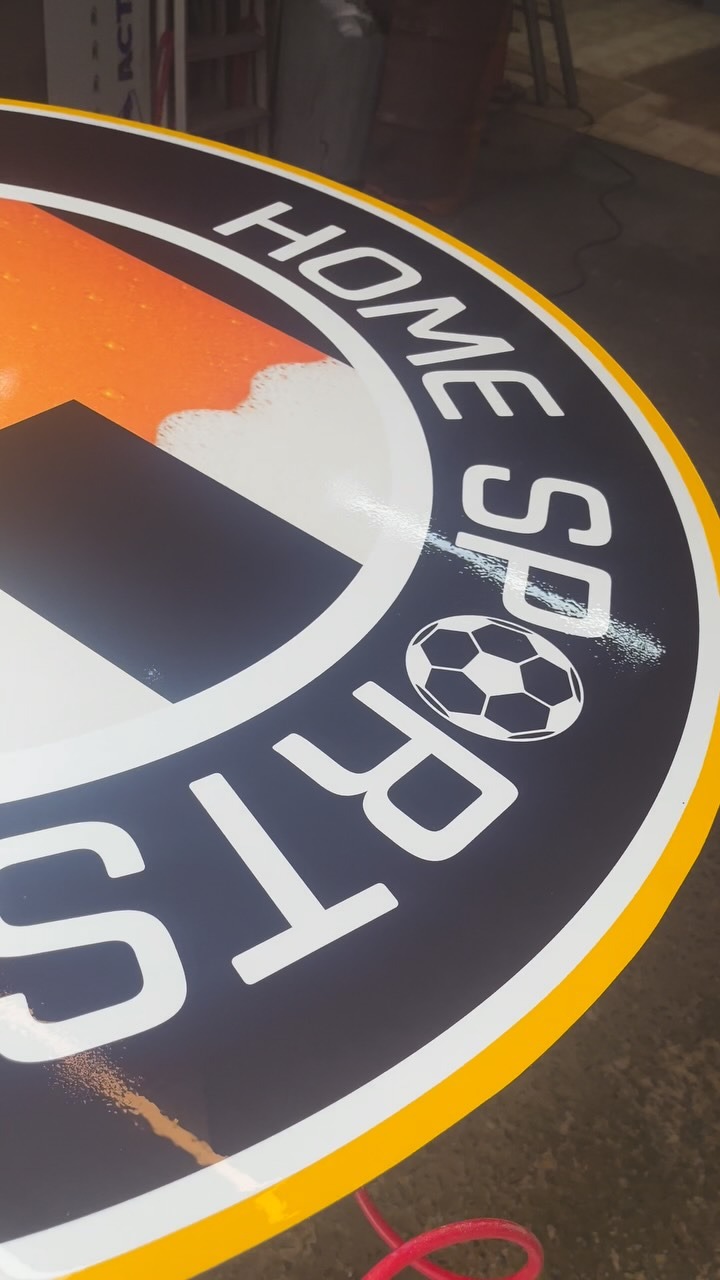 Placa circular Home Sports produzida pela Aplik Signs